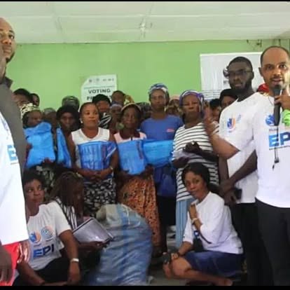 Community members and students during a pad outreach session