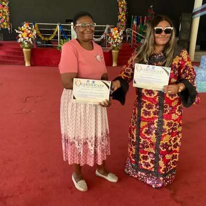 Benjamin Family Initiative women receiving certificates